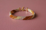 LOOM armbånd (striber - lysegul, rosa, brun, guldbelagt)